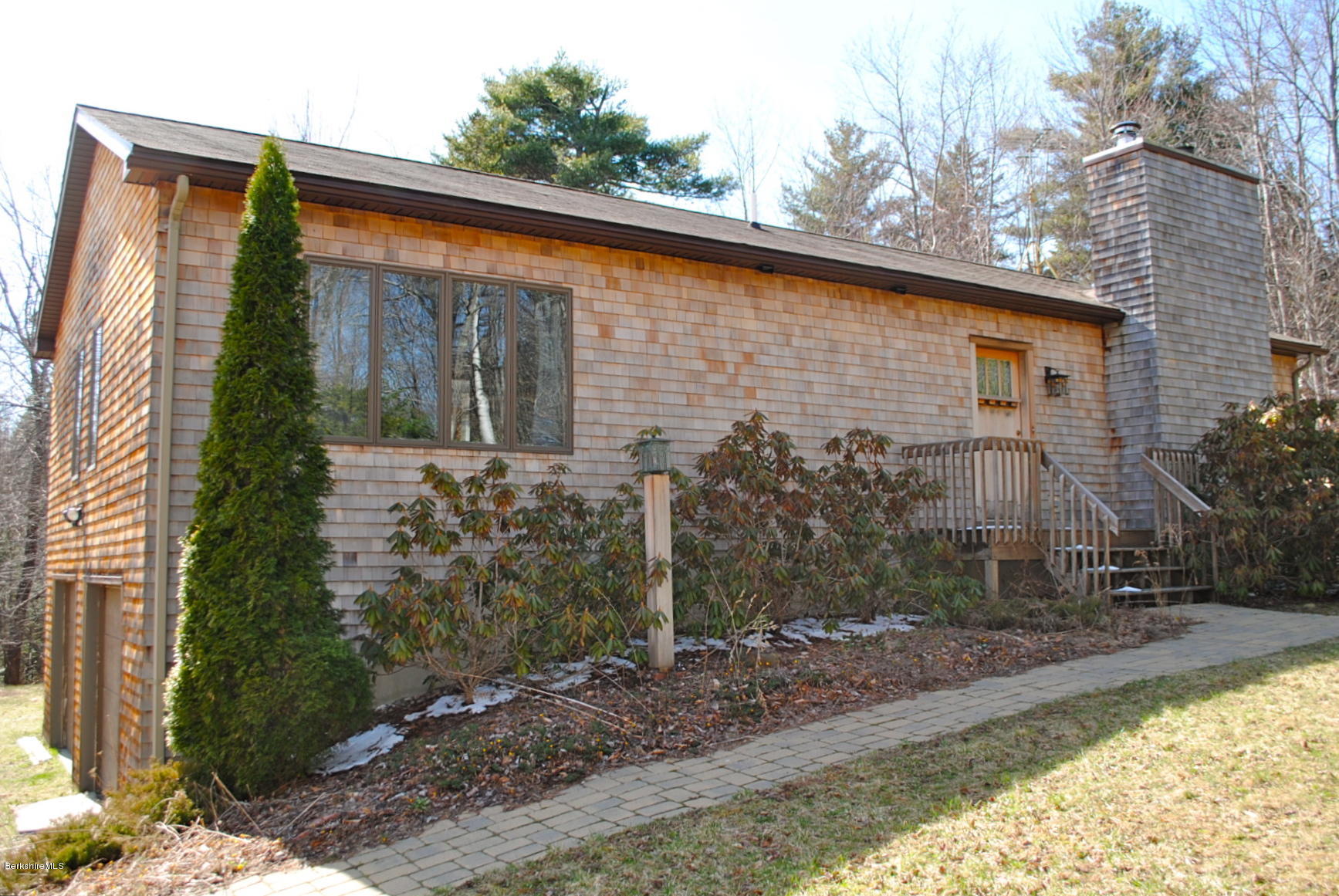 919 Fred Snow Road Becket, MA 01223 - Photo 1 of 23 a backyard of a house with lots of green space