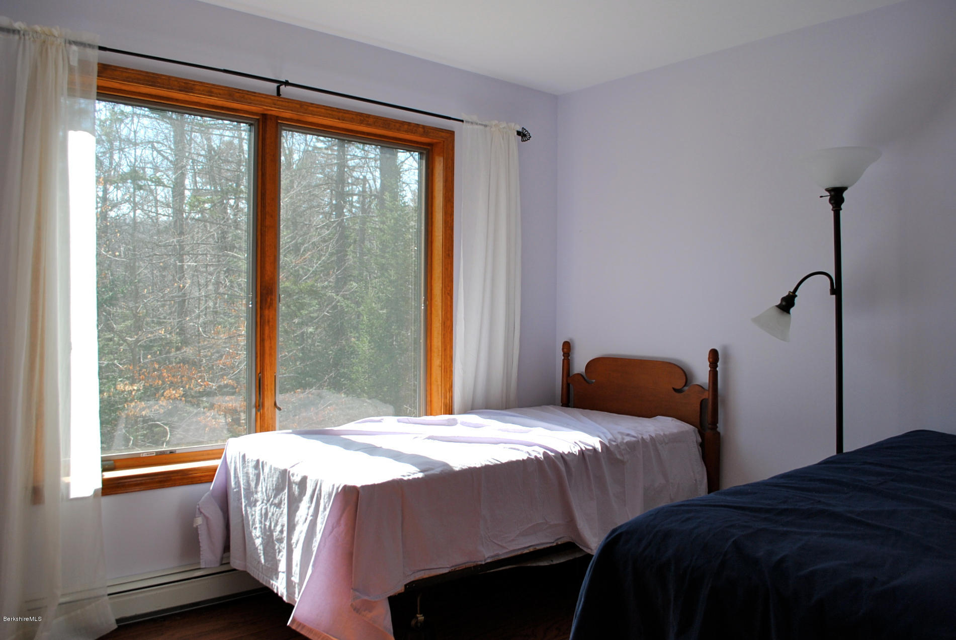 919 Fred Snow Road Becket, MA 01223 - Photo 15 of 23 a bedroom with a bed and a window