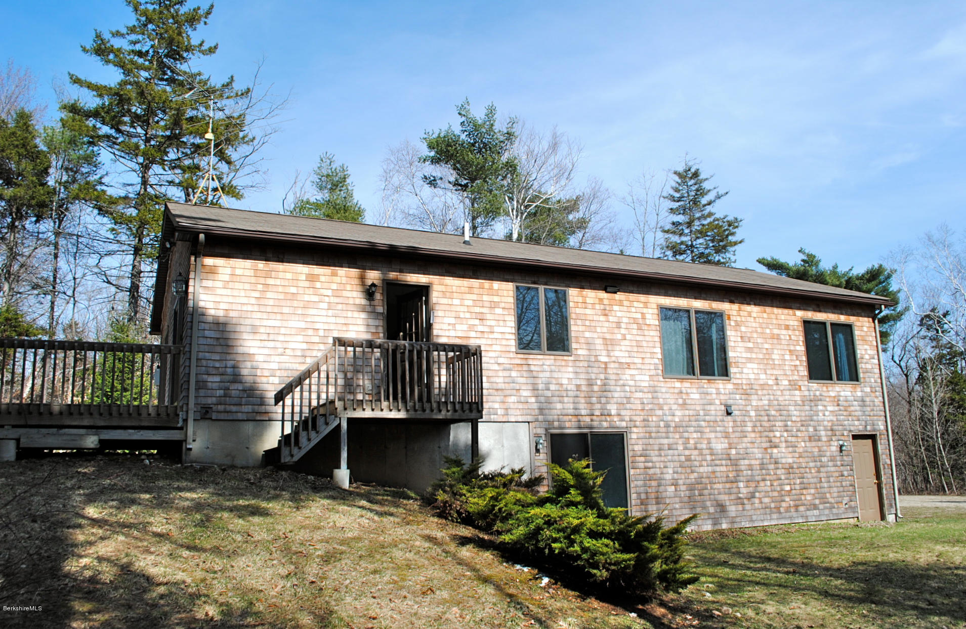 919 Fred Snow Road Becket, MA 01223 - Photo 5 of 23 a view of a house with a balcony