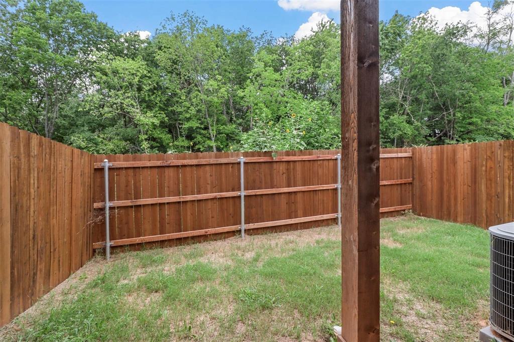1401 South 5th Avenue, Unit 1401 Denison, TX 75021 - Photo 15 of 16 a view of backyard with green space