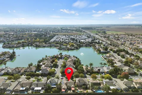an aerial view of city and lake view