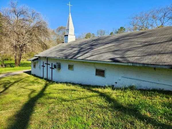 a view of a garden with an outdoor space