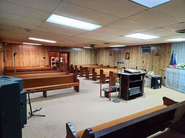 a view of walk in closet with clothes