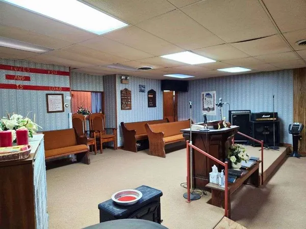 a view of a hallway with a window