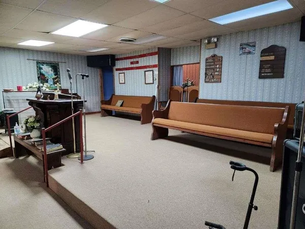 a view of a livingroom with wooden floor