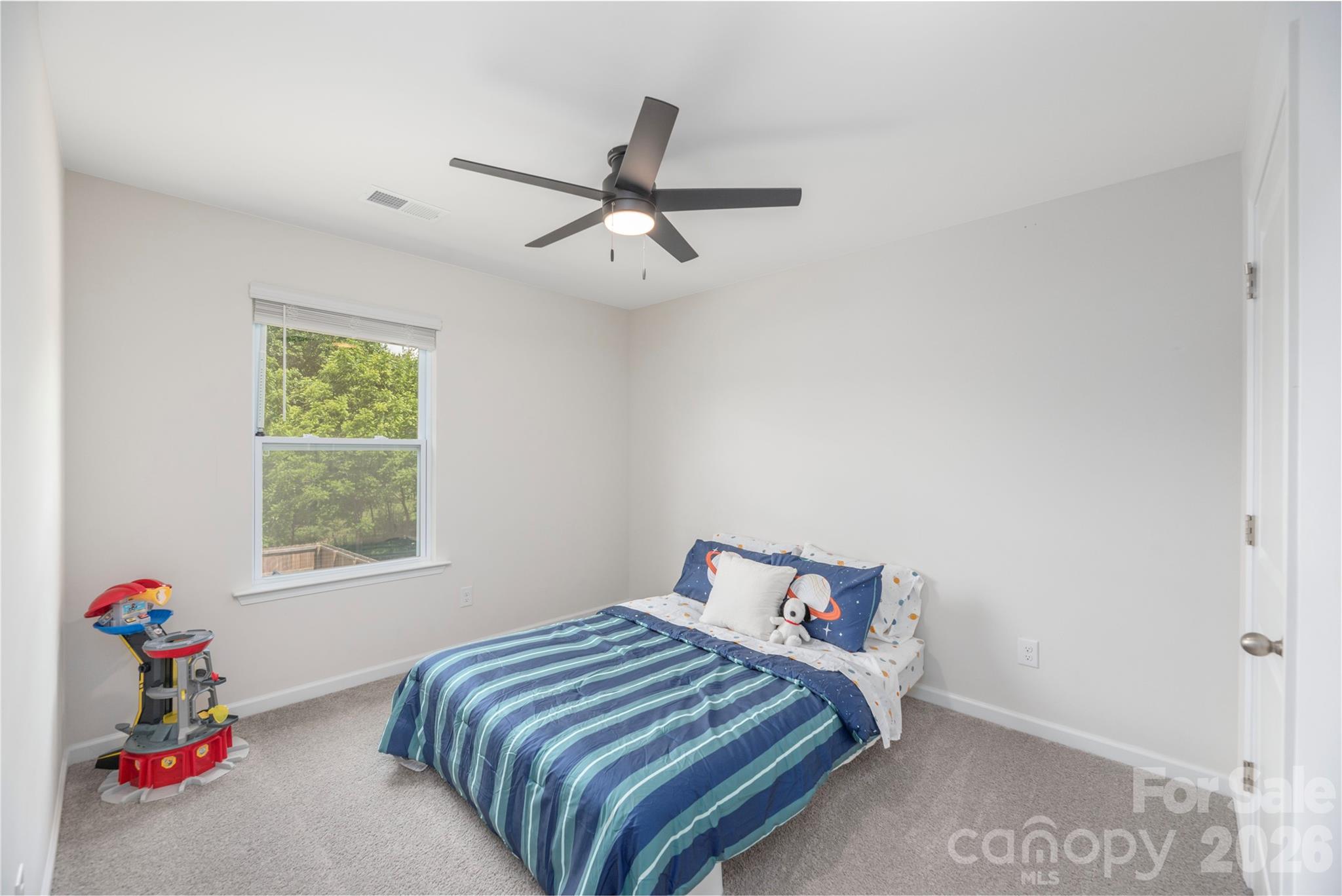8 Madelyn Drive Clyde, NC 28721 - Photo 25 of 43 a bedroom with a bed and a window