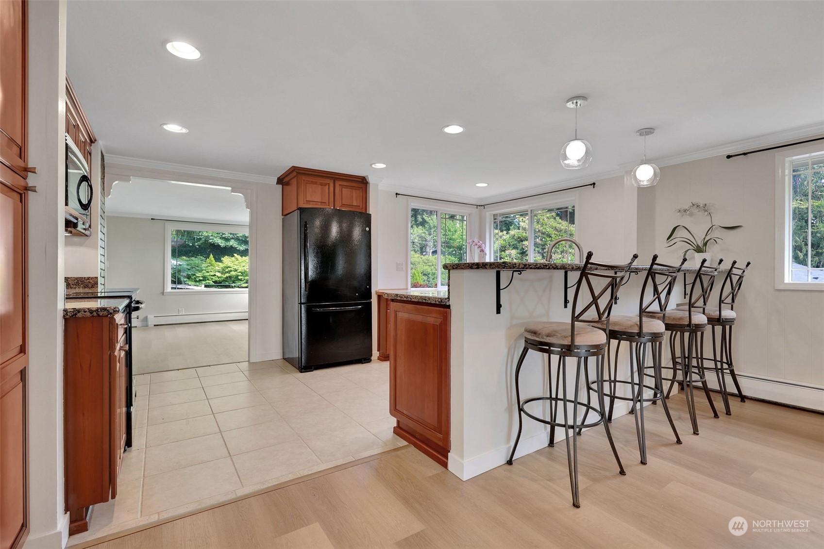 23820 7th Avenue West Bothell, WA 98021 - Photo 10 of 32 a kitchen with stainless steel appliances granite countertop a refrigerator and a stove top oven