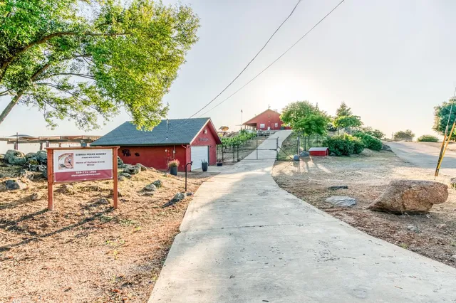 a patio with a table and chairs