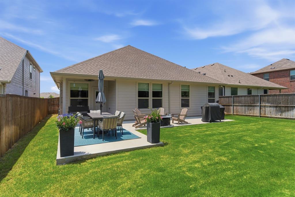 5621 Round Hl Road Denton, TX 76210 - Photo 25 of 27 a view of a house with a backyard