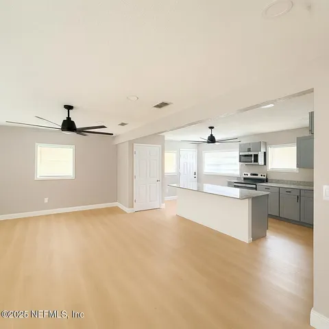 a view of a dining room with furniture
