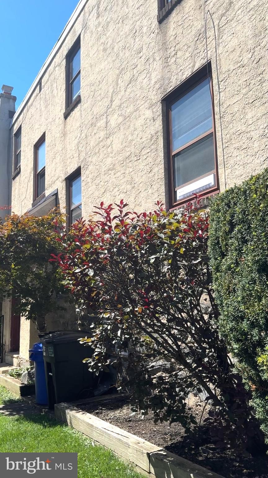 2313 Haverford Road Ardmore, PA 19003 - Photo 2 of 12 a front view of a house with garden