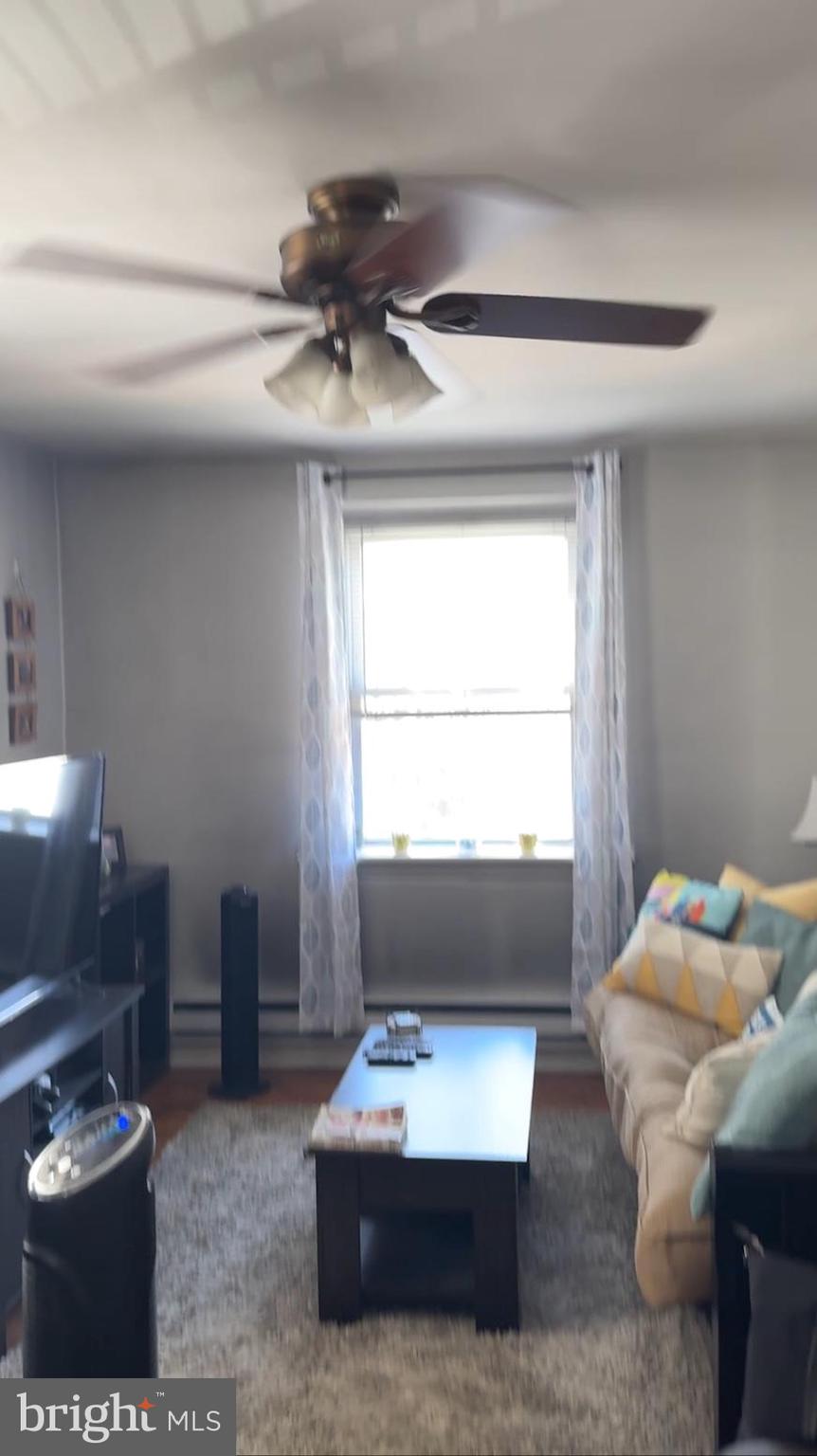 2313 Haverford Road Ardmore, PA 19003 - Photo 4 of 12 a living room with furniture and a window