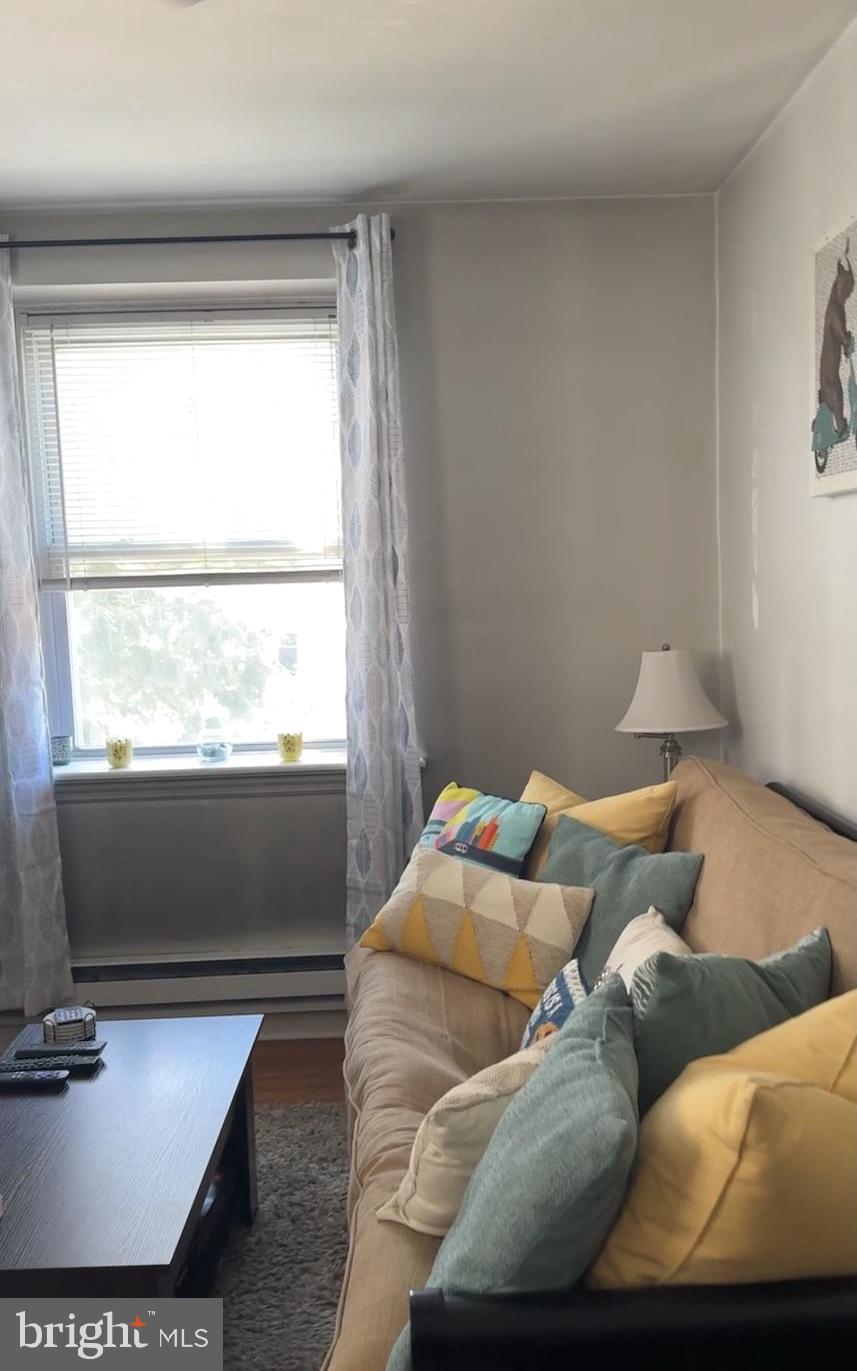 2313 Haverford Road Ardmore, PA 19003 - Photo 5 of 12 a living room with furniture and a window