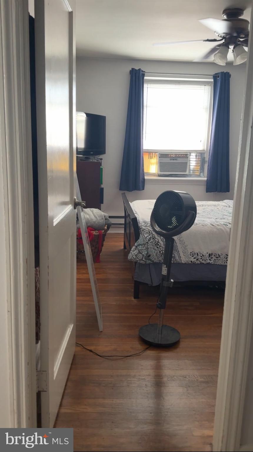 2313 Haverford Road Ardmore, PA 19003 - Photo 6 of 12 a living room with furniture and a fireplace