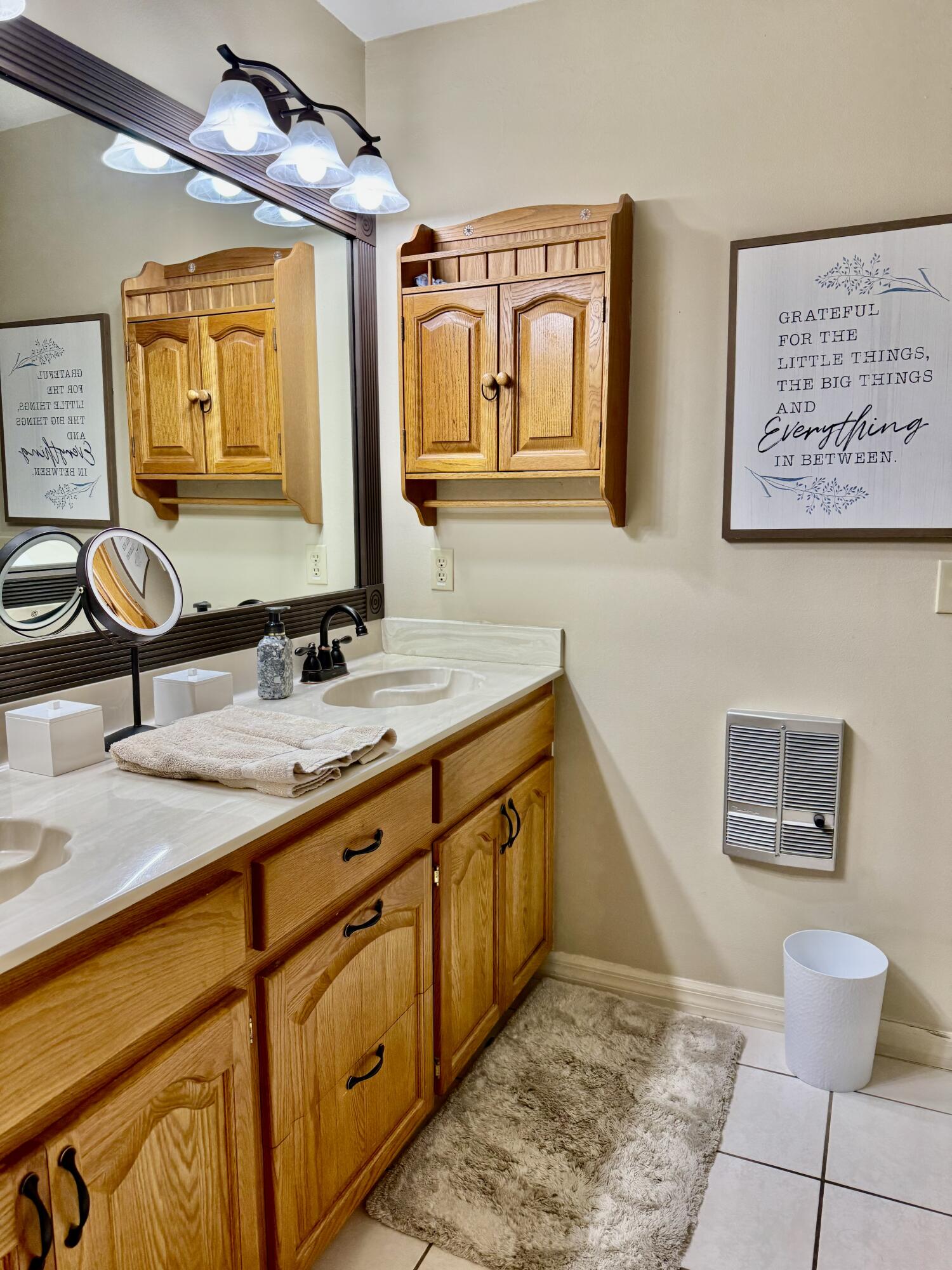 603 Southwest 15th Street Okeechobee, FL 34974 - Photo 21 of 40 a bathroom with a sink and a mirror
