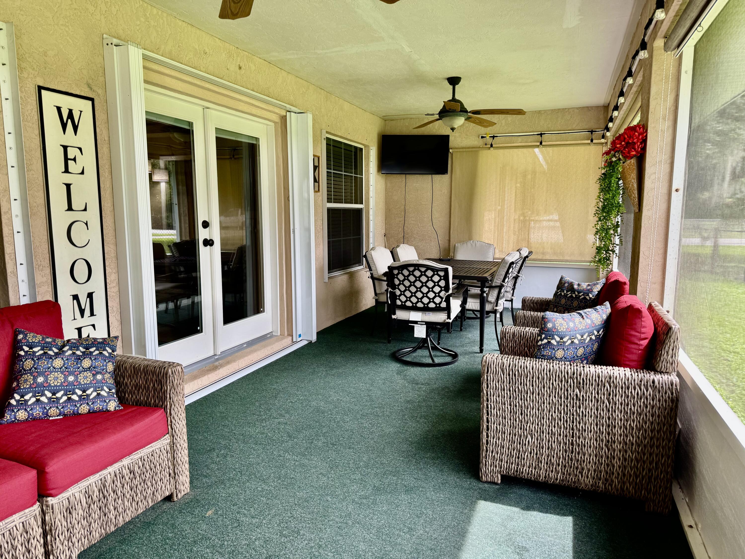 603 Southwest 15th Street Okeechobee, FL 34974 - Photo 26 of 40 a living room with furniture and a window
