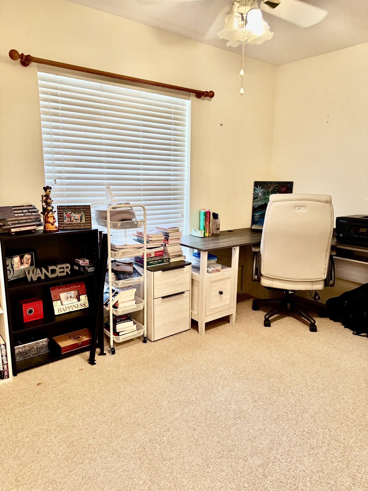 603 Southwest 15th Street Okeechobee, FL 34974 - Photo 28 of 40 a living room with furniture and a flat screen tv