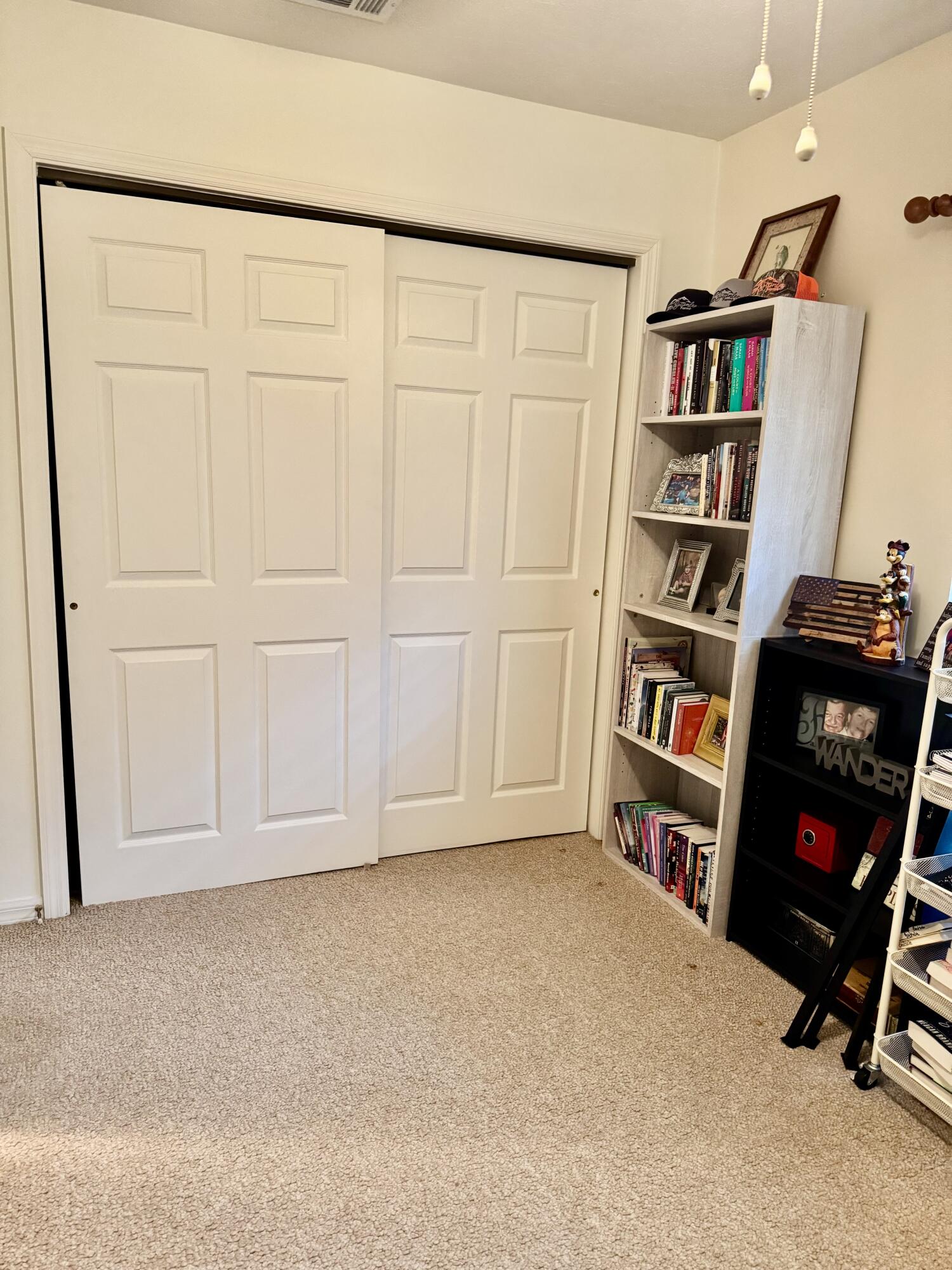 603 Southwest 15th Street Okeechobee, FL 34974 - Photo 29 of 40 a view of an empty room with shelves