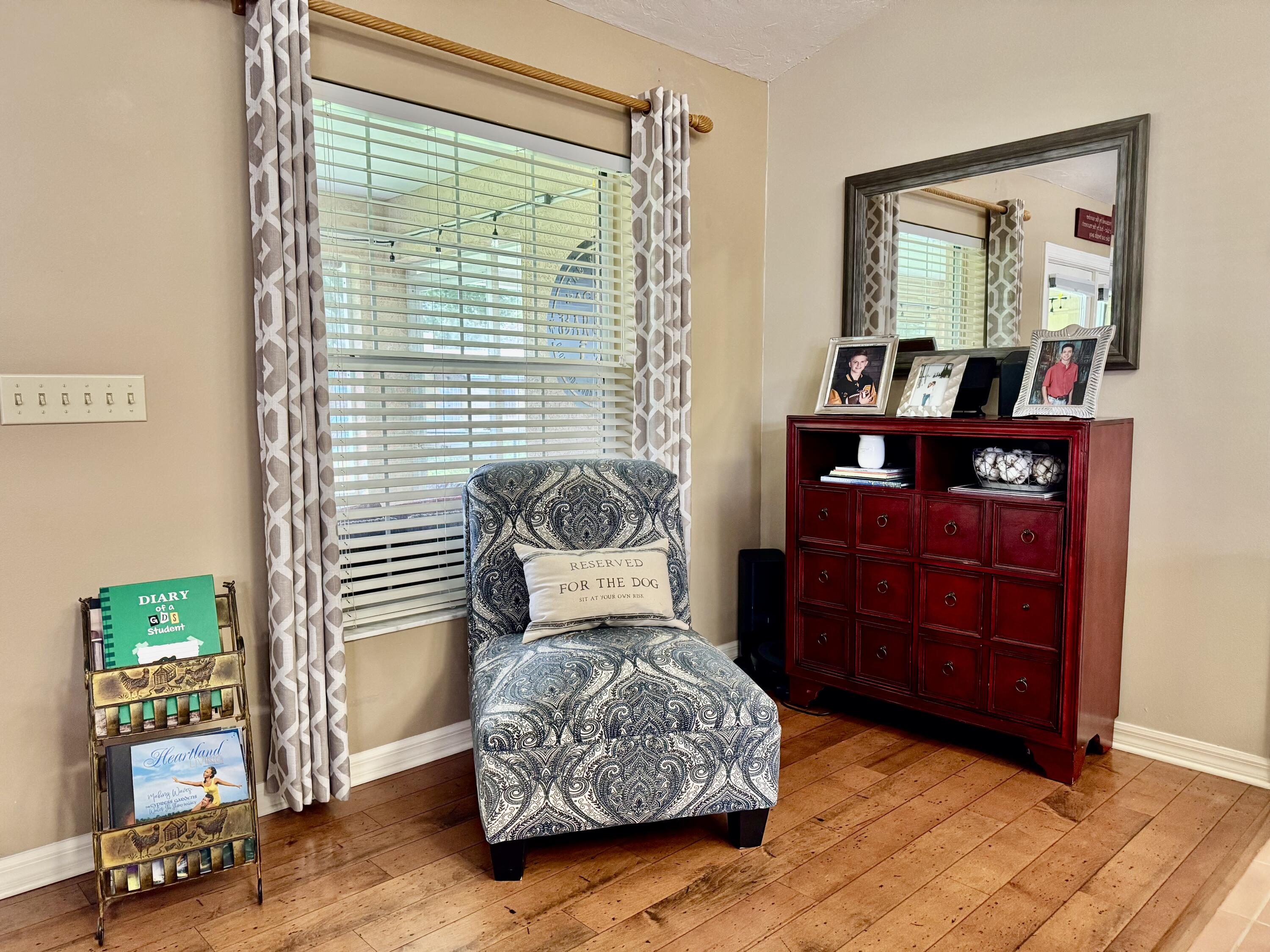 603 Southwest 15th Street Okeechobee, FL 34974 - Photo 10 of 40 a living room with furniture and a flat screen tv
