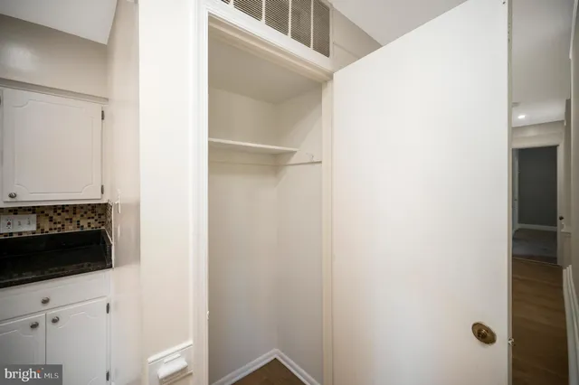 a bathroom with a shower and a stove