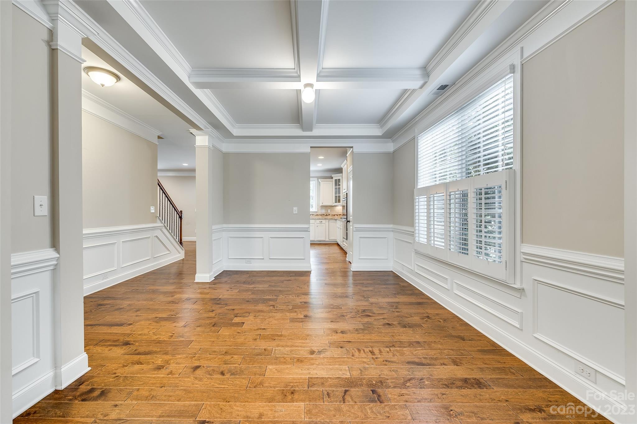 868 Coralbell Way Tega Cay, SC 29708 - Photo 11 of 45 a view of empty room with wooden floor and fan