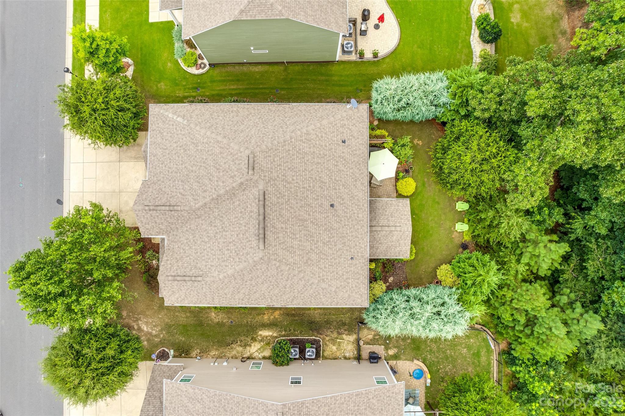 868 Coralbell Way Tega Cay, SC 29708 - Photo 39 of 45 an aerial view of a house with a yard and garden