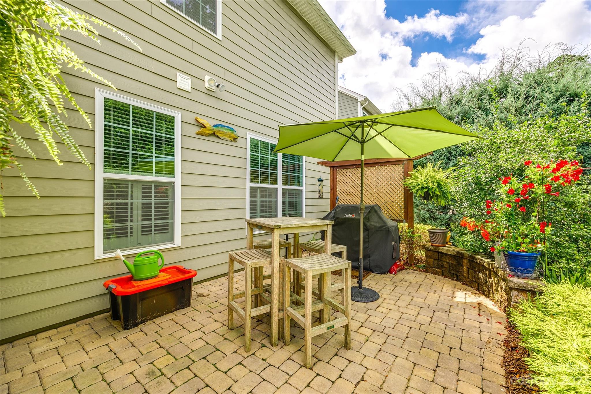 868 Coralbell Way Tega Cay, SC 29708 - Photo 5 of 45 a garden view with a sitting space