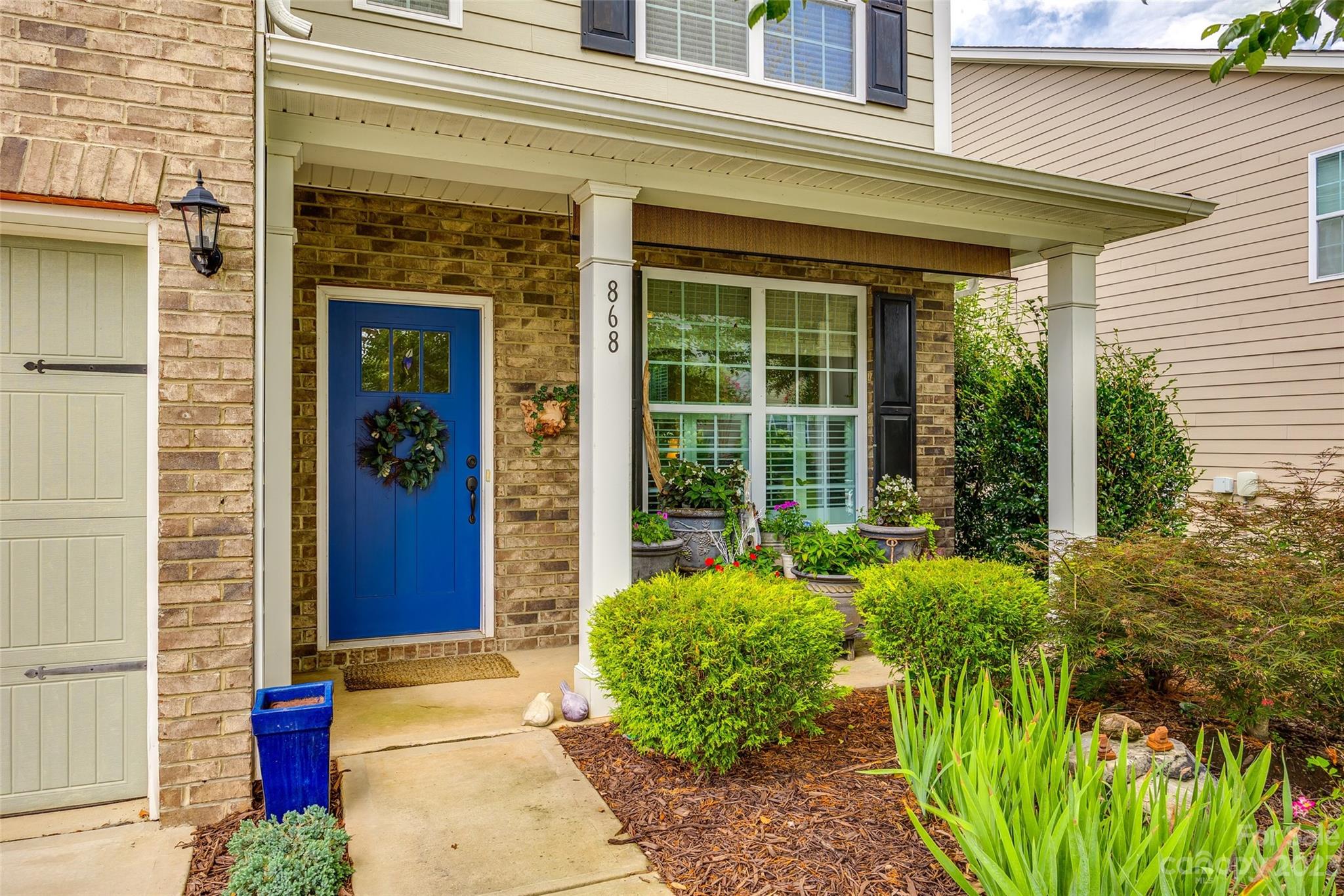 868 Coralbell Way Tega Cay, SC 29708 - Photo 6 of 45 a house with a outdoor space