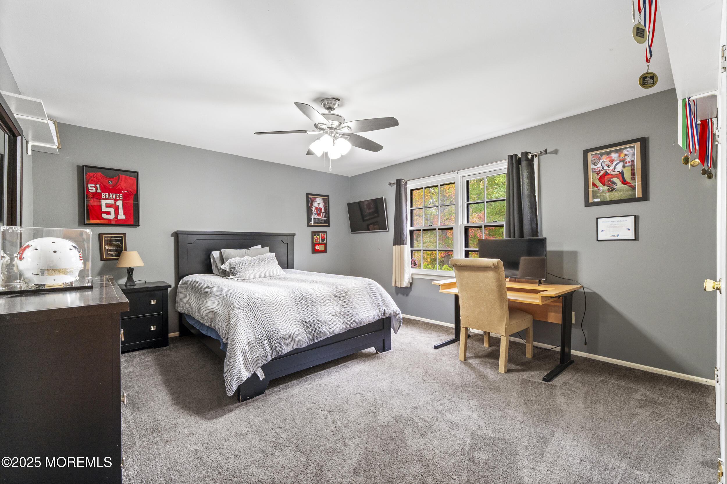 16 Timber Lane Manalapan, NJ 07726 - Photo 26 of 54 a bedroom with a bed and a table in it