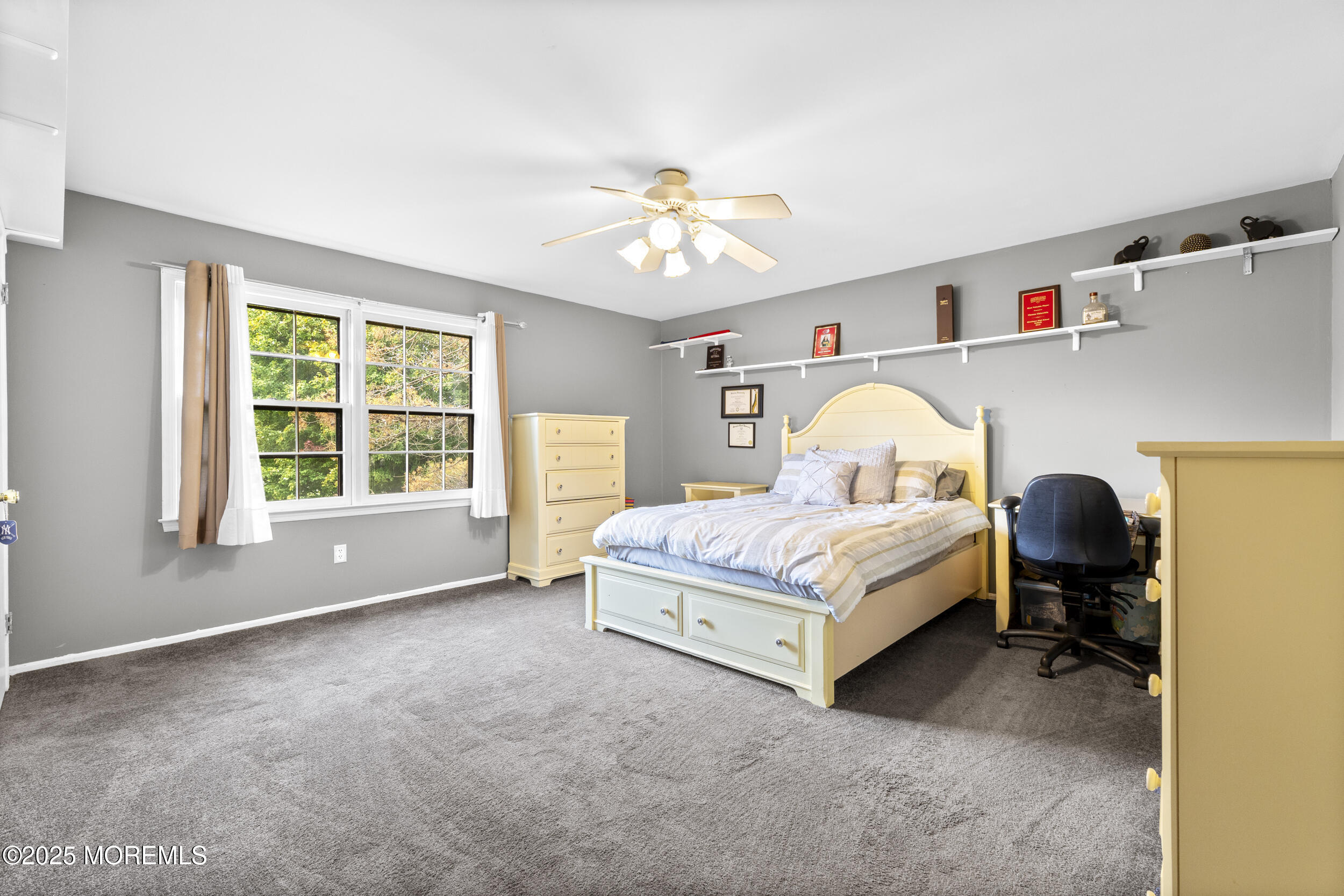 16 Timber Lane Manalapan, NJ 07726 - Photo 30 of 54 a bed room with a bed and a window