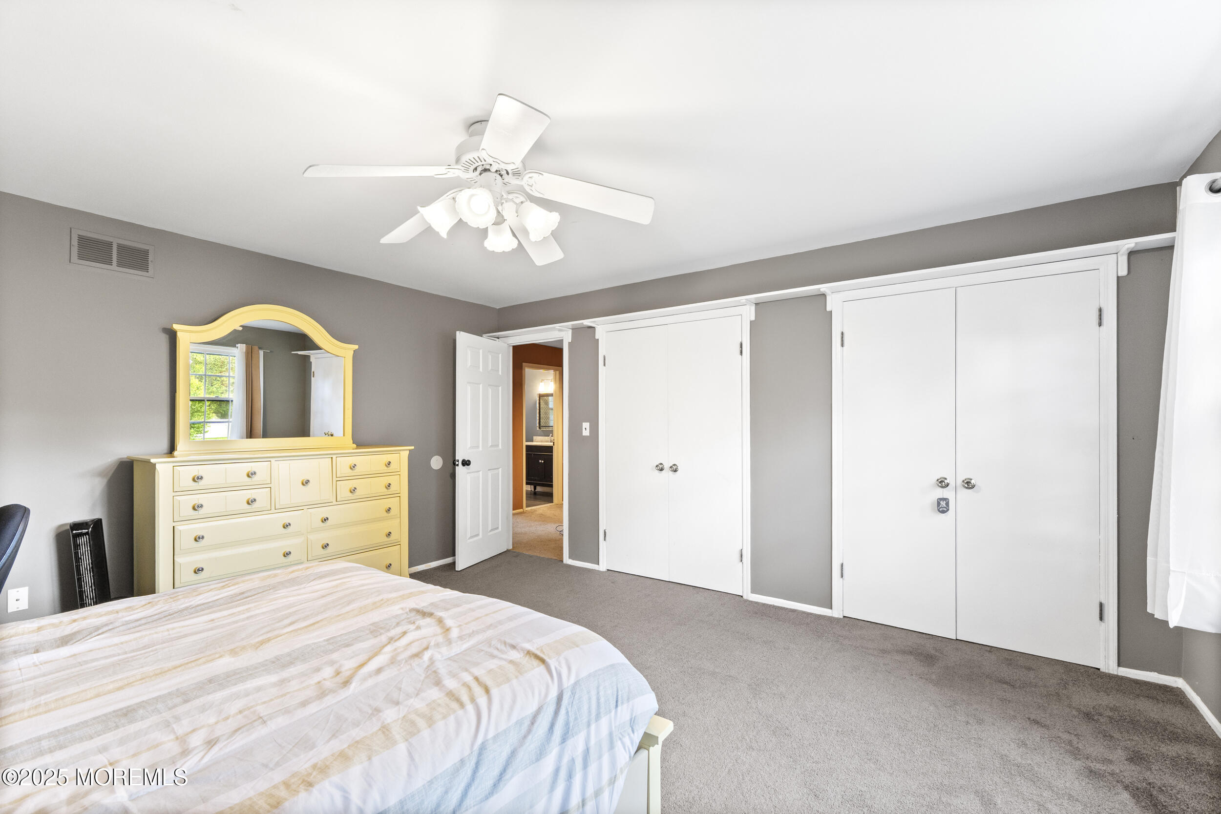 16 Timber Lane Manalapan, NJ 07726 - Photo 31 of 54 a bedroom with a bed and wooden floor