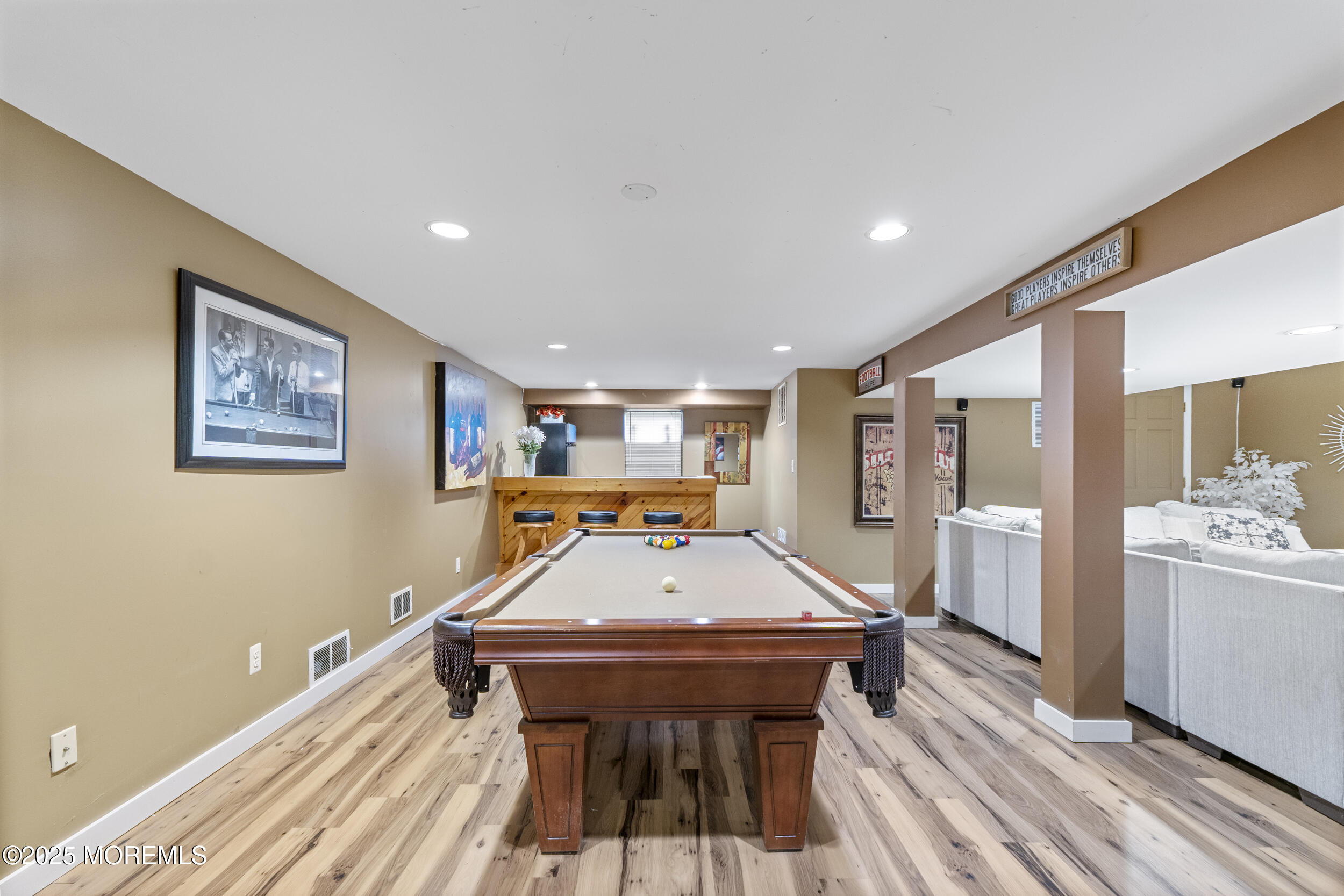 16 Timber Lane Manalapan, NJ 07726 - Photo 33 of 54 a room with wooden floor table and window