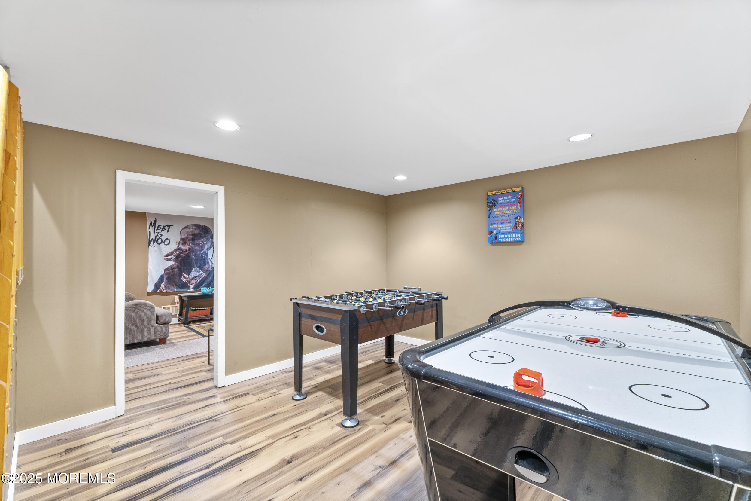 16 Timber Lane Manalapan, NJ 07726 - Photo 36 of 54 a bedroom with a bed and wooden floor