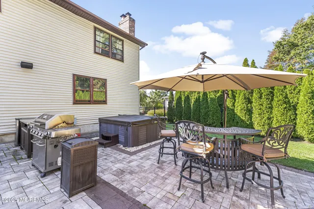 a view of a yard with furniture