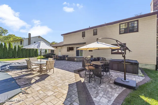 a view of a city with lush green forest