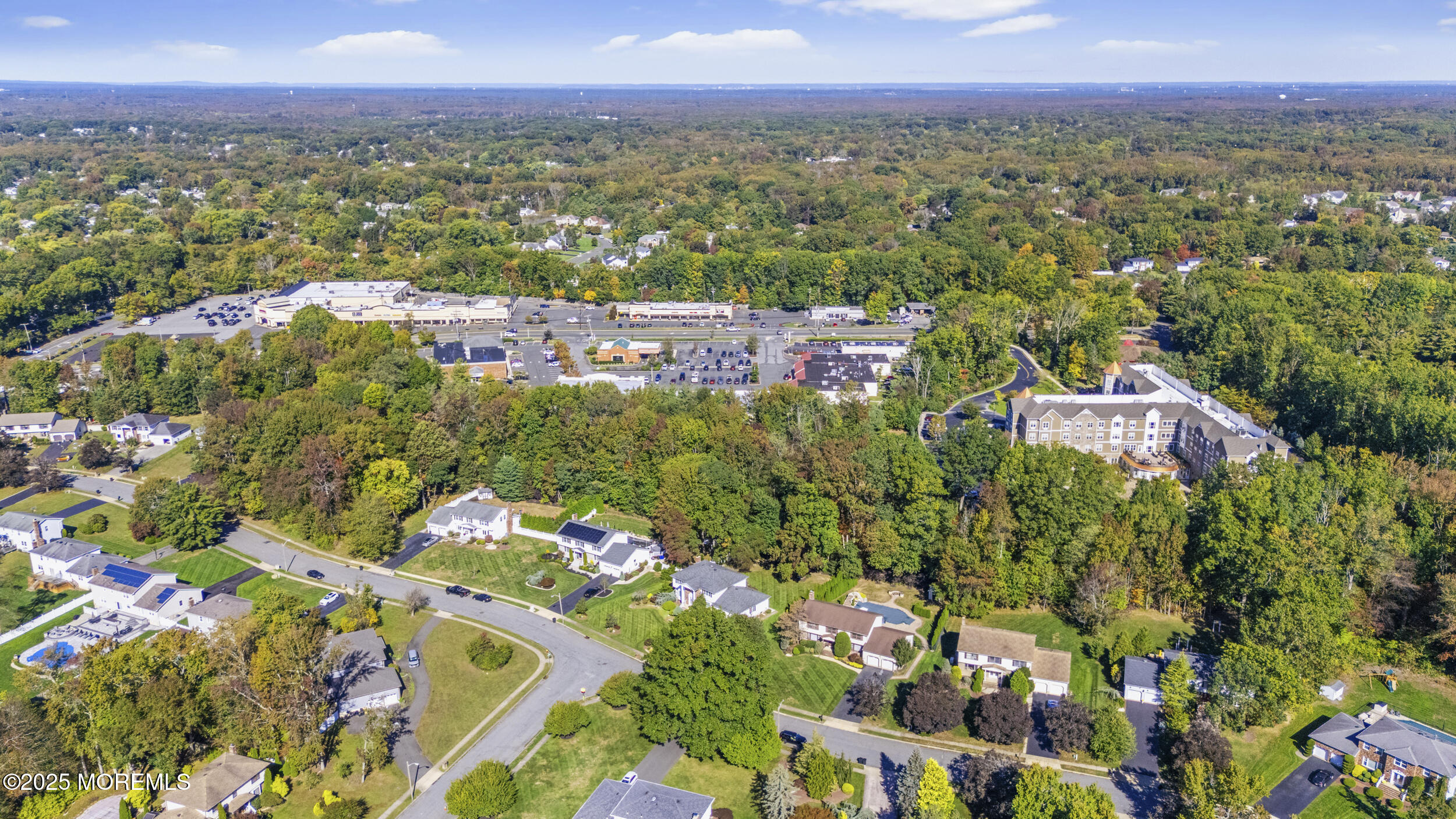 16 Timber Lane Manalapan, NJ 07726 - Photo 52 of 54 a view of a city with a lake
