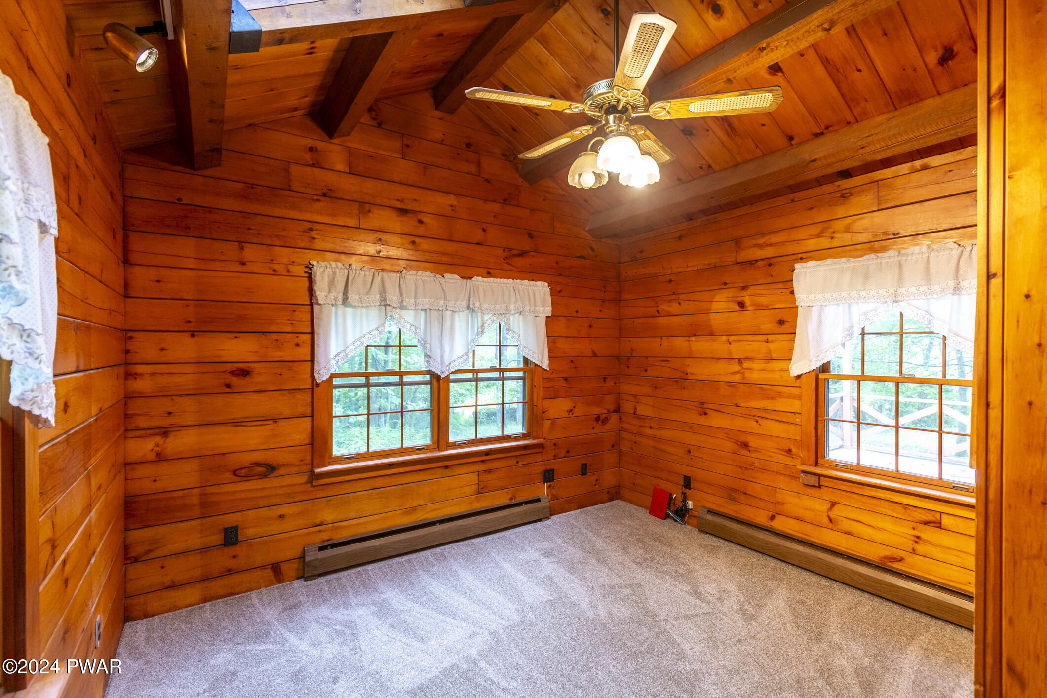52 Wash Road Waymart, PA 18472 - Photo 34 of 90 a view of a room with exposed radiator and windows