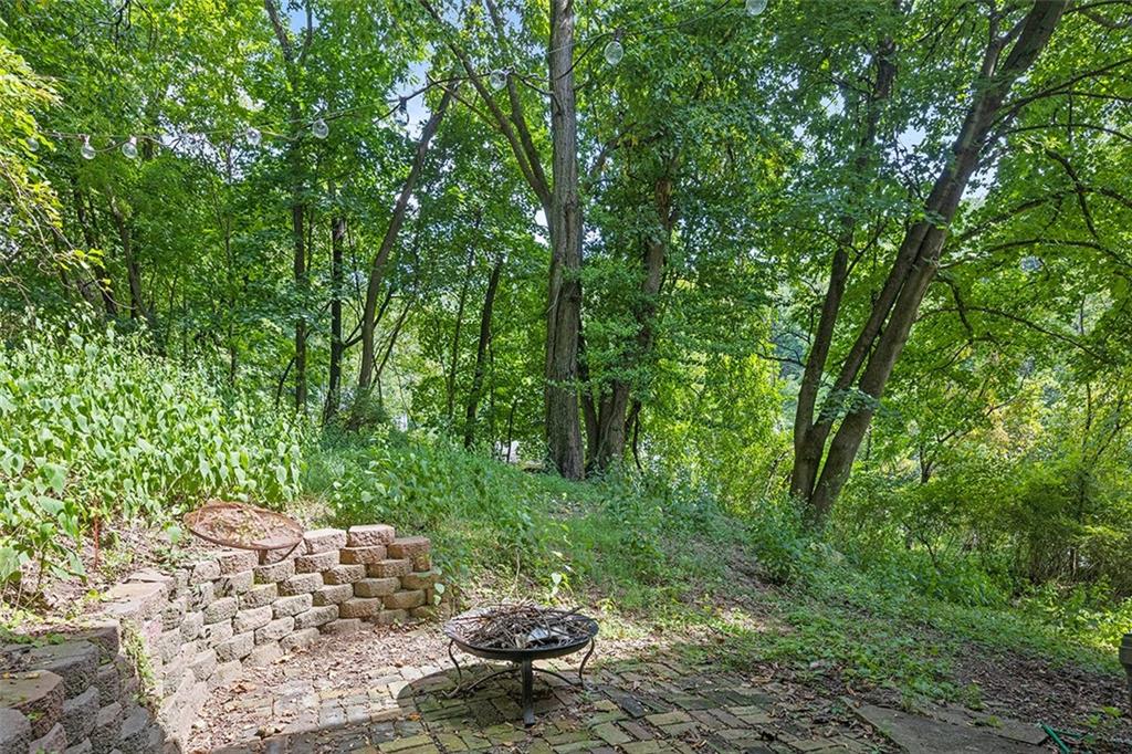 908 Dickson Road Sewickley, PA 15143 - Photo 3 of 23 a garden view with a seating space