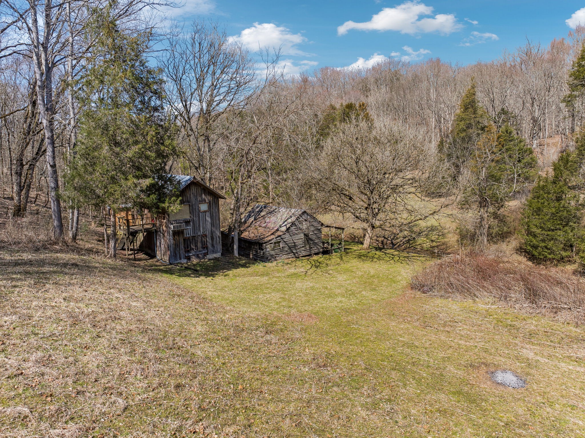 6528 Neeley Creek Road Celina, TN 38551 - Photo 44 of 61 a view of a house with a yard and covered with snow