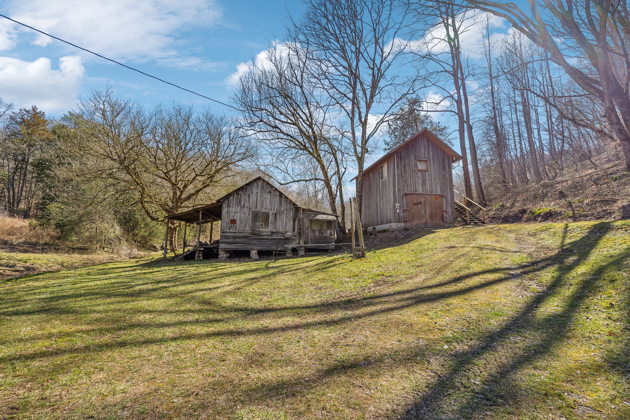6528 Neeley Creek Road Celina, TN 38551 - Photo 5 of 61 a view of large house with a big yard