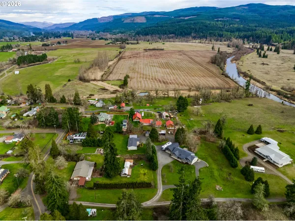 a view of a swimming pool with a yard