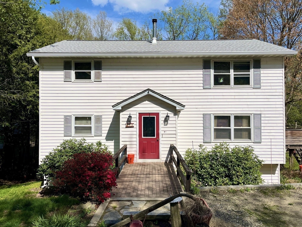 15 Old County Road Holland, MA 01521 - Photo 1 of 22 a front view of a house with yard