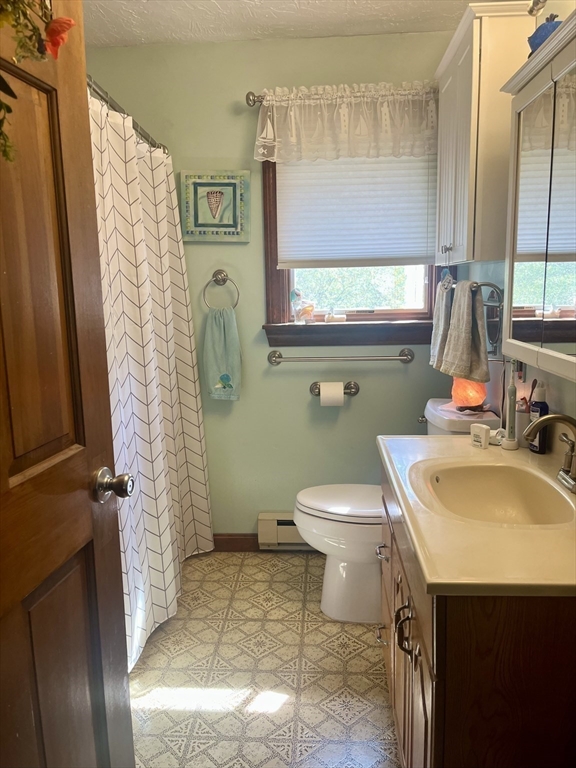 15 Old County Road Holland, MA 01521 - Photo 5 of 22 a bathroom with a sink toilet and shower