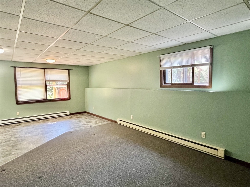 15 Old County Road Holland, MA 01521 - Photo 9 of 22 an empty room with windows