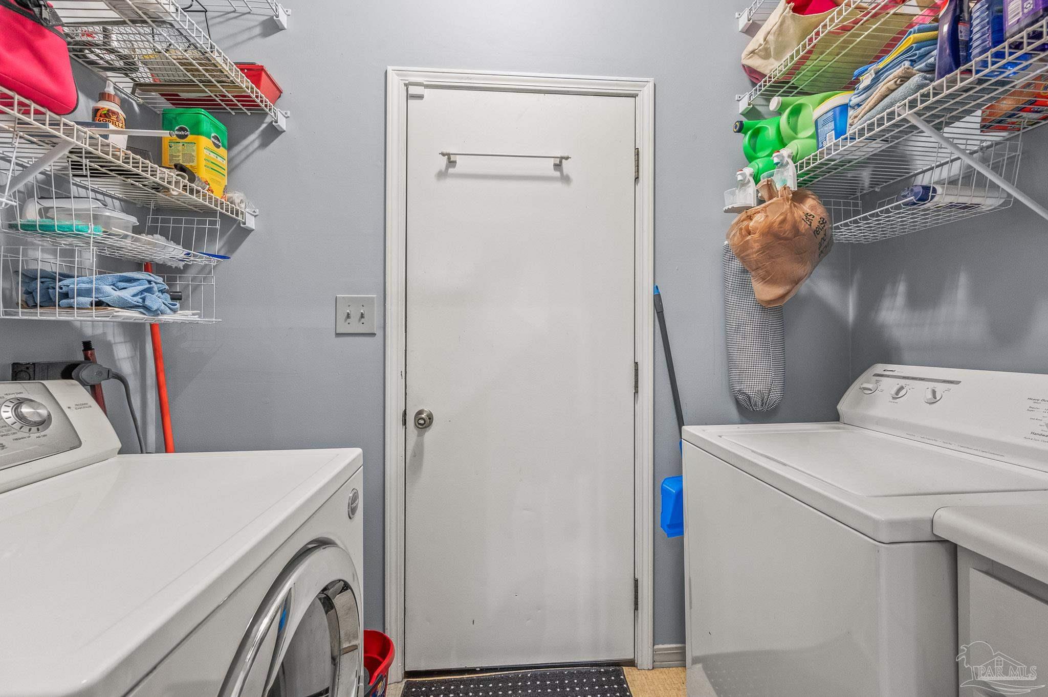 601 East Burgess Road, Unit K1 Pensacola, FL 32504 - Photo 12 of 41 a utility room with dryer and washer