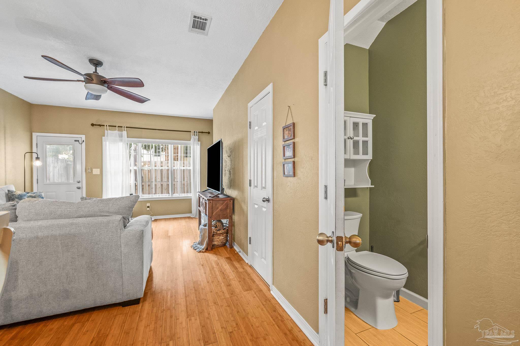 601 East Burgess Road, Unit K1 Pensacola, FL 32504 - Photo 18 of 41 a spacious bathroom with a bathtub and a toilet