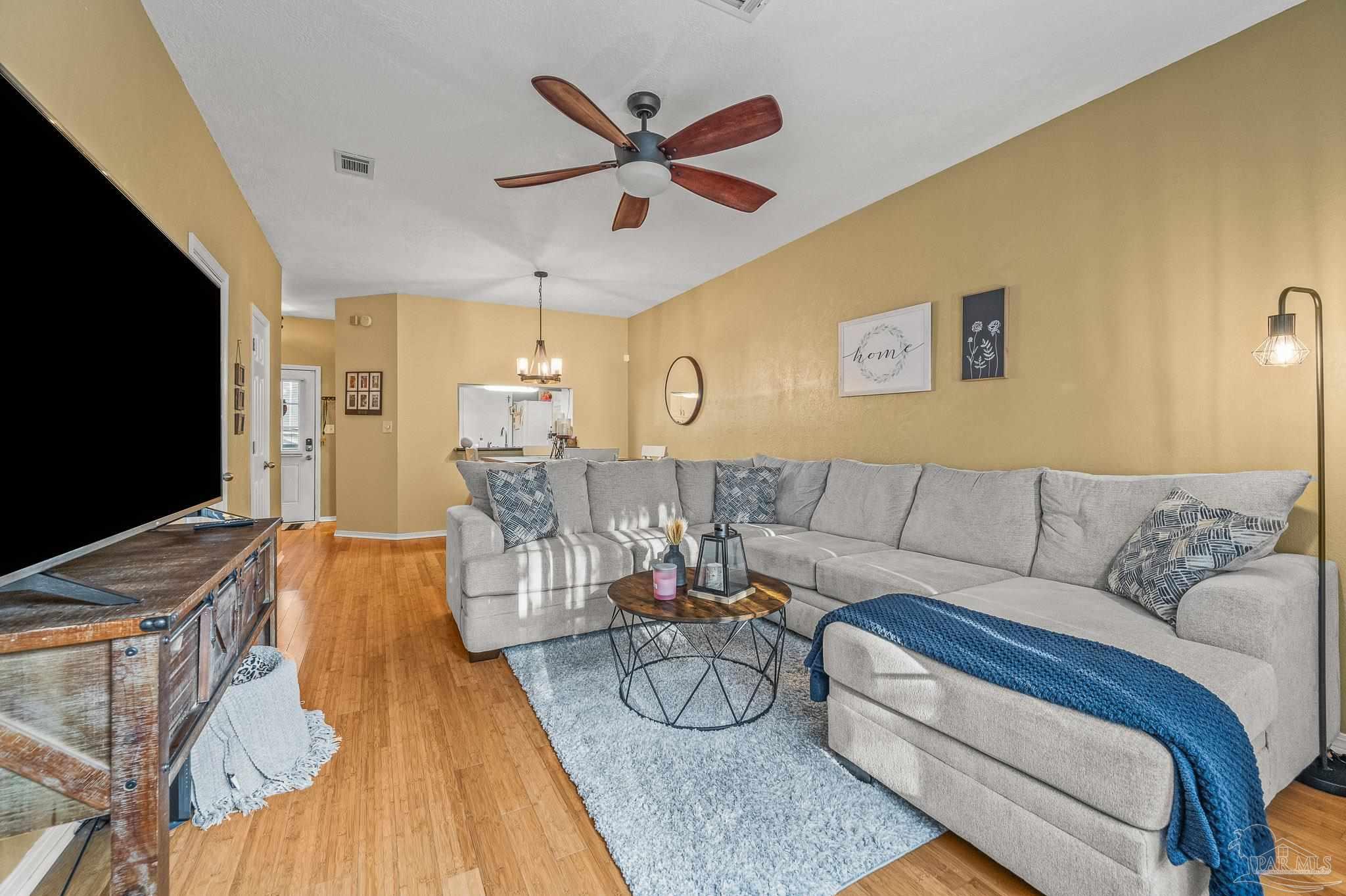 601 East Burgess Road, Unit K1 Pensacola, FL 32504 - Photo 19 of 41 a living room with furniture and a flat screen tv