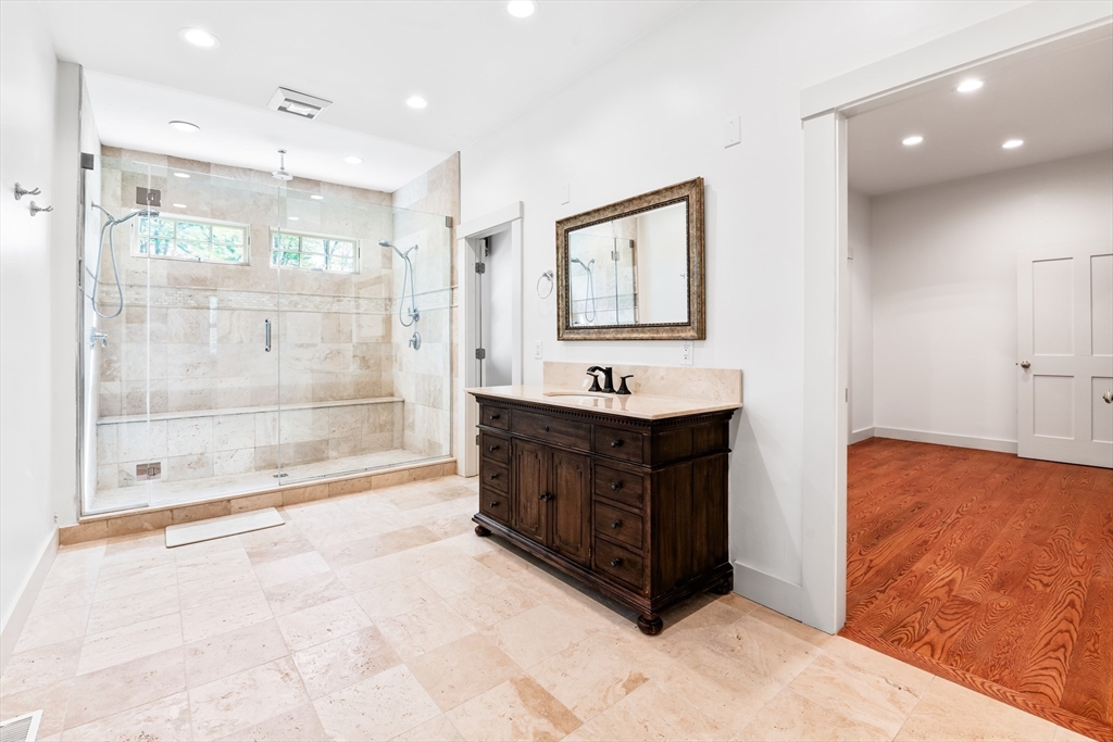 62 Old River Place Dedham, MA 02026 - Photo 18 of 39 a bathroom with double vanity sink and mirror