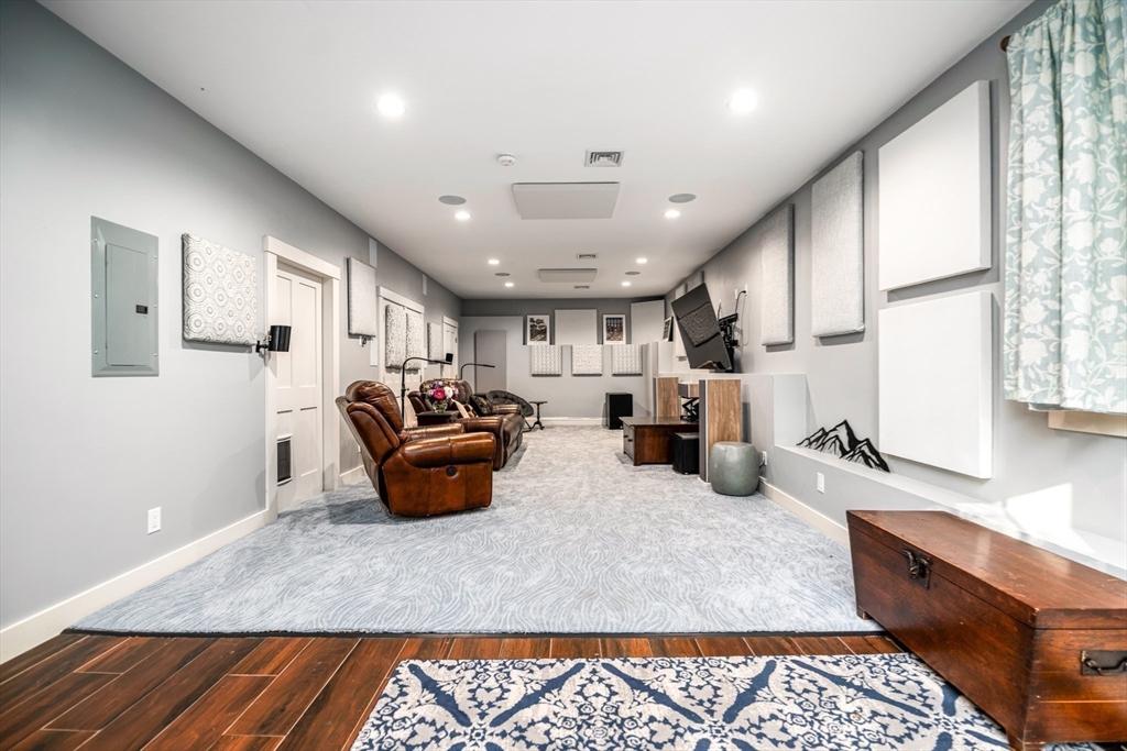 62 Old River Place Dedham, MA 02026 - Photo 29 of 39 a room with furniture and a couch