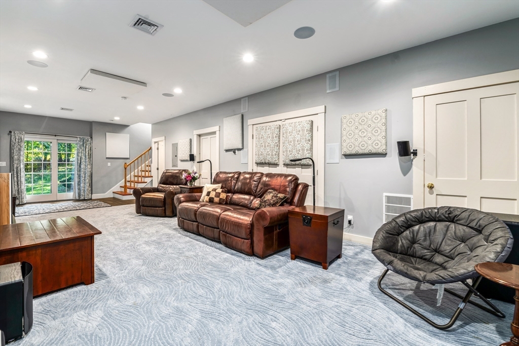 62 Old River Place Dedham, MA 02026 - Photo 30 of 39 a living room with furniture and a large window